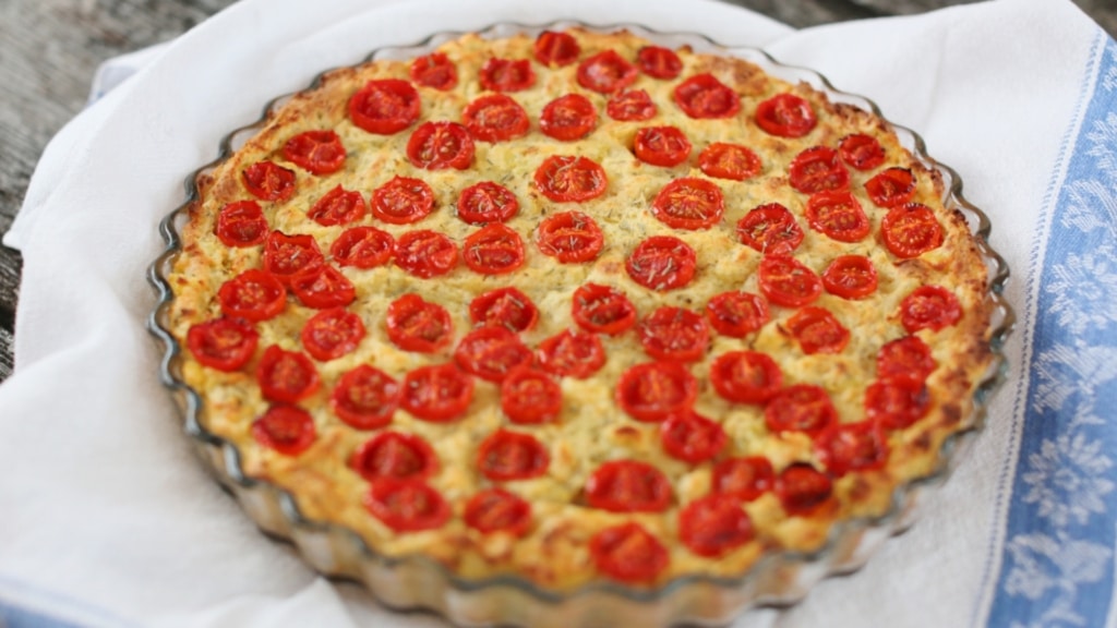 Quiche dish with potato and cherry tomato casserole